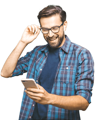 Man interacting with his phone and smiling